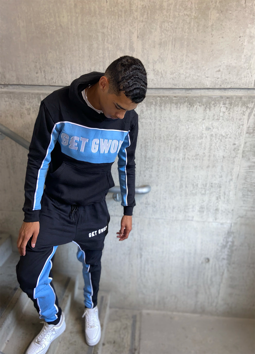 Blue and black sweatsuit sale